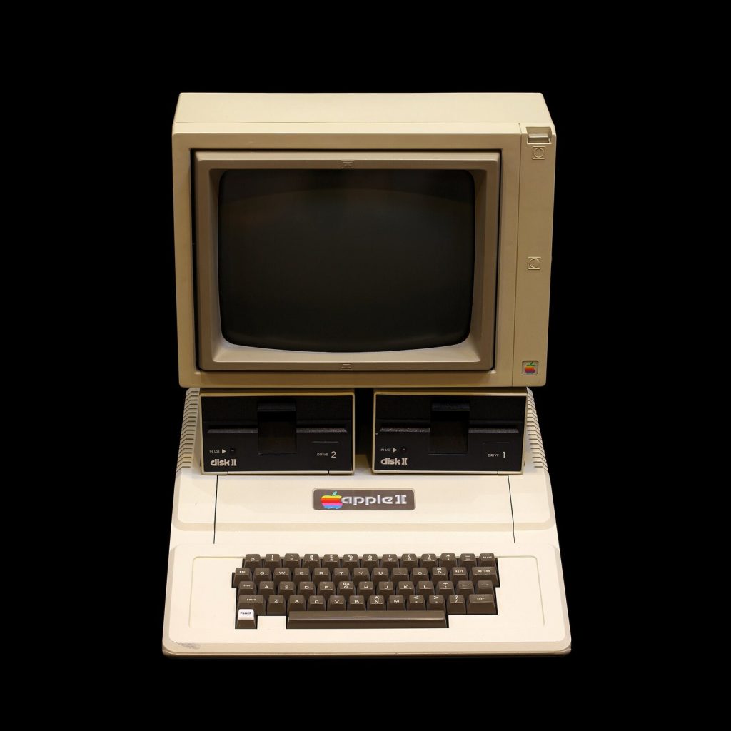 Apple II computer with keyboard and monitor on display at the Musée Bolo in Lausanne